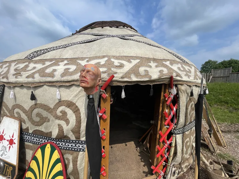 The painted doorway of the yurt seen from outside