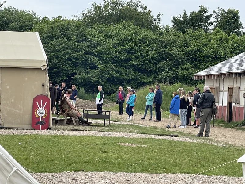 Visitors gathered for a talk beside the display area