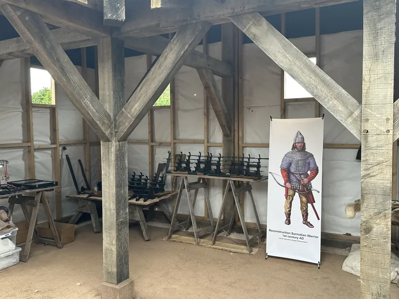 The display room set up, blades racked on trestles beneath the Sarmatian banner